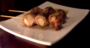 Quail Eggs Wrapped In Bacon - Photo by Philadining.com