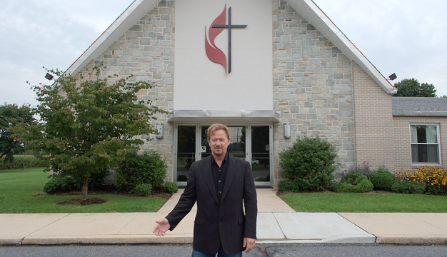 Schaefer stands in front of Zion United Methodist Church of Iona in South Lebanon Township.