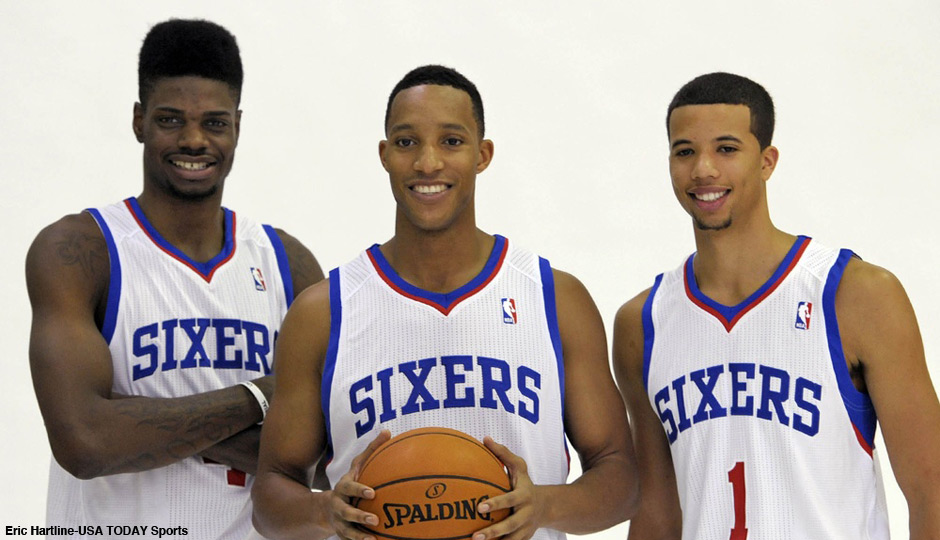 Philadelphia 76ers center Nerlens Noel (4), small forward Evan Turner (12) and point guard Michael Carter-Williams (1) during a media day photo shoot at Philadelphia College of Osteopathic Medicine. 