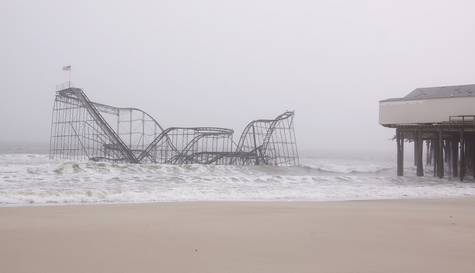 SEASIDE HEIGHTS, NJ - JAN 13: The Casino Pier Star Jet roller coaster submerged in the sea on January 13, 2013 in Seaside Heights, NJ. Clean up continues 75 days after Hurricane Sandy struck in 2012.