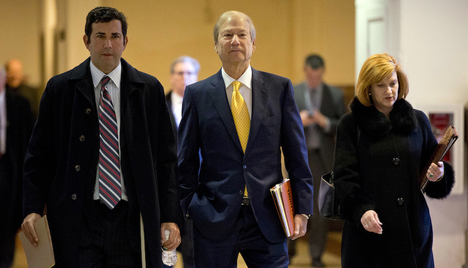 Businessman and co-owner of The Philadelphia Inquirer Lewis Katz, center, walks to Judge Patricia McInerney's courtroom, Wednesday, Nov. 13, 2013, at City Hall in Philadelphia. McInerney is scheduled to hear arguments over who should control The Philadelphia Inquirer and Philadelphia Daily News. (AP Photo/Matt Rourke)