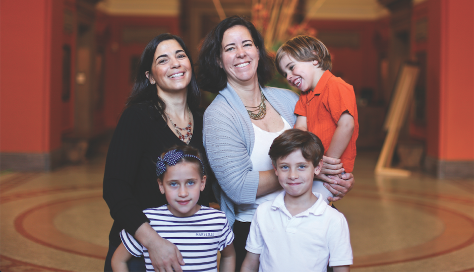 Dee Spagnuolo L'03 (left) and partner Sasha Ballen have their hands full with three active children. Beau, 3 (on top); Elio, 6; and Marina, 6. Sagnuolo, a former Penn Law class president, and Ballen are fighting the State of Pennsylvania's effort to revoke their marriage license. Photo by Carly Teitelbaum.
