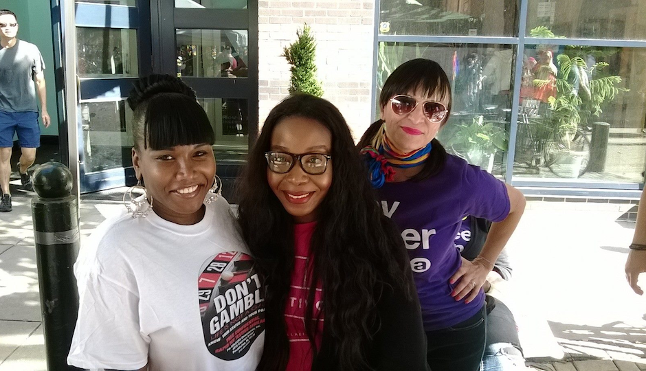 Morrison-Summers (center) out-reaching at OutFest with Chasity Moore and GALAEI Executive Director Elicia Gonzales. 