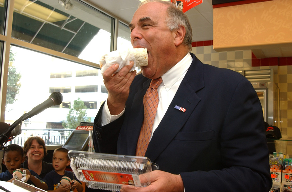 Pennsylvania Gov. Ed Rendell tastes the new Rendelli Wrap, a sandwich named after him, at a Wawa convenience store Tuesday, September 23, 2003, in Philadelphia. AP Photo| Jessica Griffin 