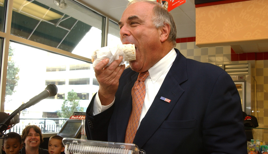 Pennsylvania Gov. Ed Rendell tastes the new Rendelli Wrap, a sandwich named after him, at a Wawa convenience store Tuesday, September 23, 2003, in Philadelphia. AP Photo| Jessica Griffin