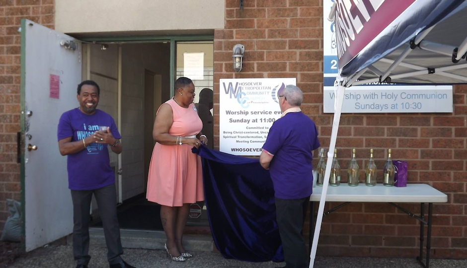 Rev. Jordan-Picket (far left) unveils the new church sign with Lay Delegate Renee Williams and Board Vice Moderator Arthur Martin Chester.