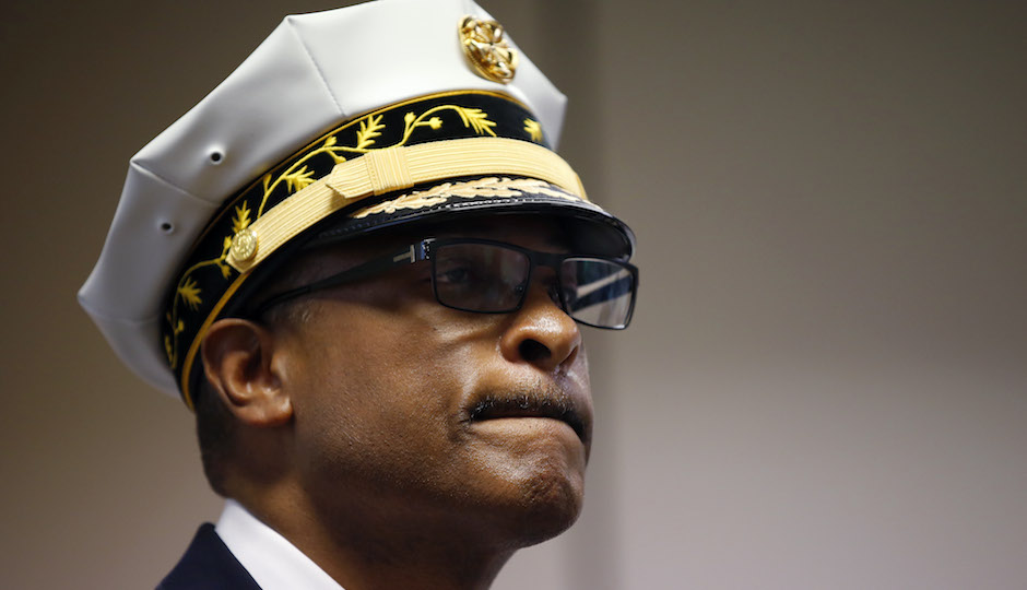 Philadelphia Fire Commissioner Derrick Sawyer pauses while speaking during a news conference after weekend fire tore through 10 row homes and killed four children just steps from a firehouse, Tuesday, July 8, 2014, in Philadelphia. (AP Photo/Matt Slocum)