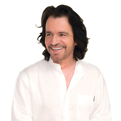 Our "Stinker of the Month" is Yanni, playing The Mann Center on August 23d. 