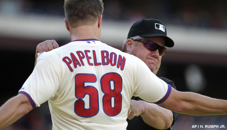 Philadelphia Phillies pitcher Jonathan Papelbon argues with Umpire Joe West after being ejected from the game against the Miami Marlins in the ninth inning of a baseball game Sunday, Sept. 14, 2014, in Philadelphia. The Marlins won 5-4. 