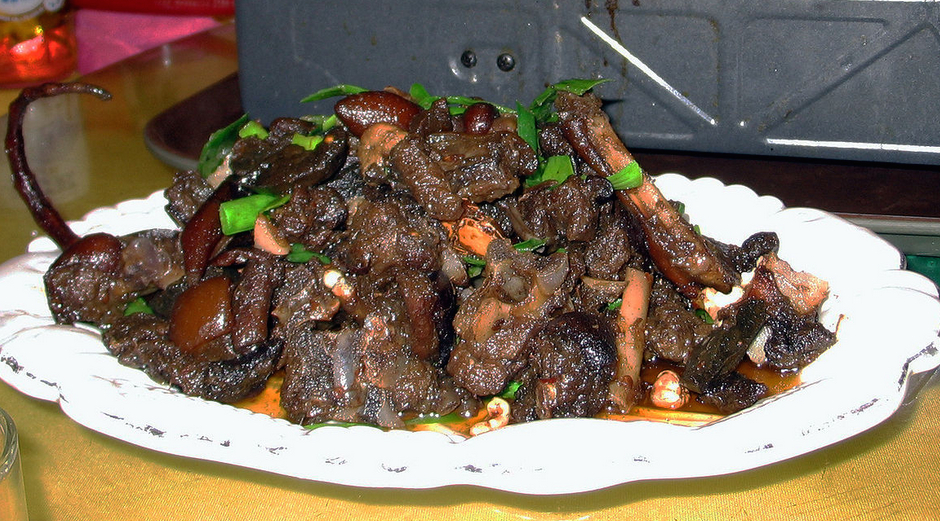 A platter of cooked dog meat in China.