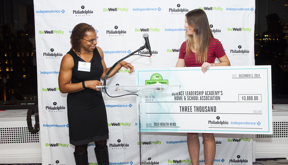 Health Hero Challenge winner Pia Martin accepting her $3,000 check for Science Leadership Academy | Photograph by Nell Hoving