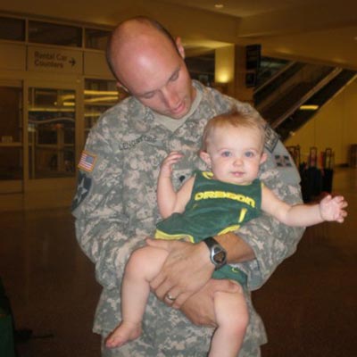 Army Sgt. Joshua Lengstorf with his daughter, Kadence.