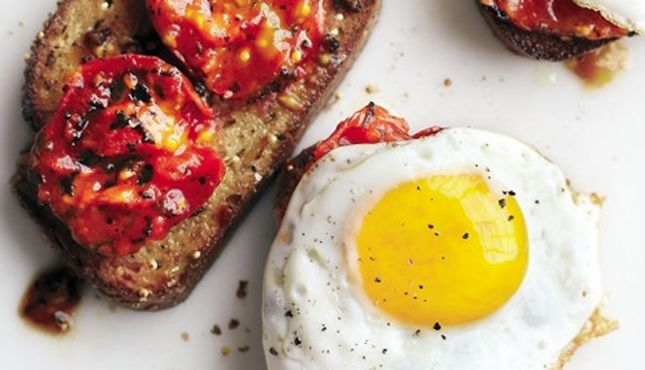 Charred Tomatoes with Fried Eggs on Garlic Toast