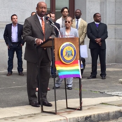 Mayor Nutter at the 2014 LGBT History Celebration at City Hall, Casarez looks on. | Photo by Bryan Buttler