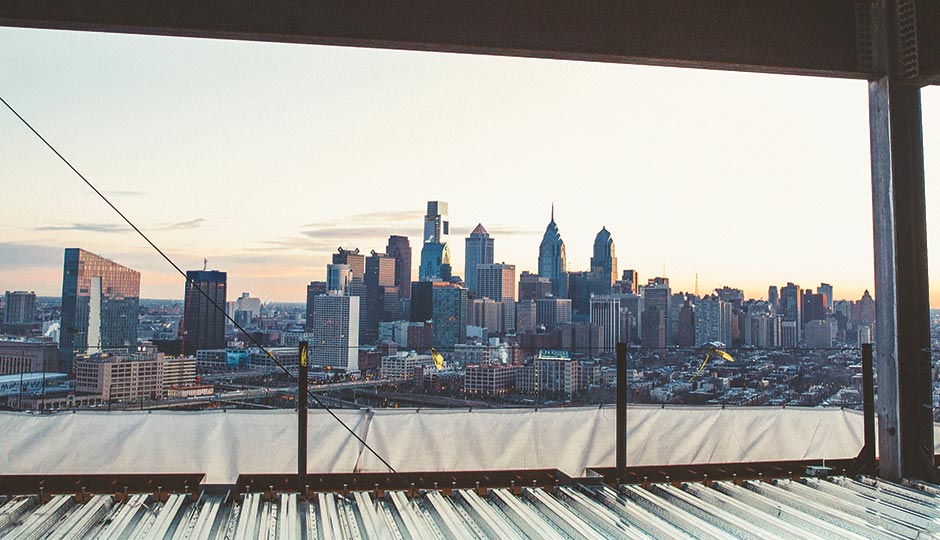 A view of Center City from Penn Medicine’s Center for Advanced Cellular Therapeutics, taken on a February morning at sunrise. Photograph by Chris Sembrot