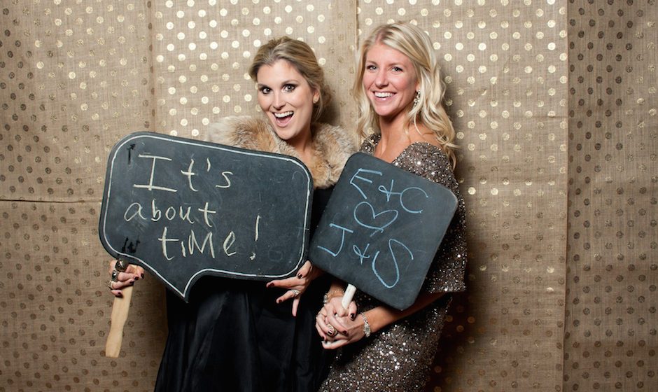 Philly Mag lifestyle editor Emily Goulet and PW's editor Carrie Denny hopped in the photo booth at a friend's wedding. Photo by JPG Photography
