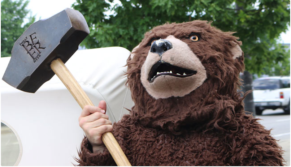 A very important photo of a bear holding the Hammer of Glory