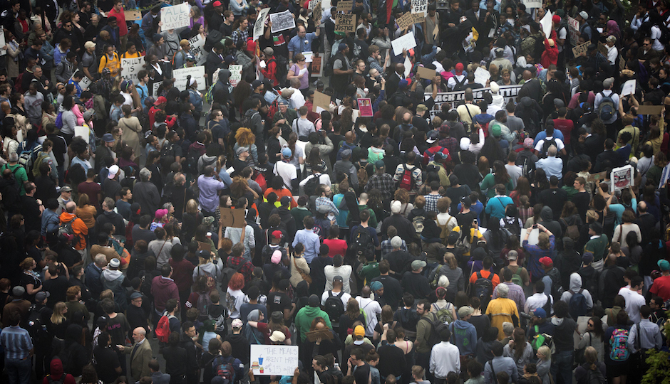 Protesters demonstrate outside City Hall in Philadelphia on Thursday, April 30, 2015. The event in Philadelphia follows days of unrest in Baltimore amid Freddie Gray's police-custody death. | Photo by Matt Rourke/AP