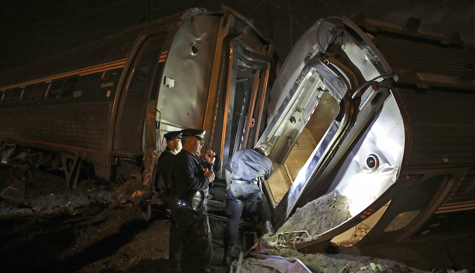 Emergency personnel work the scene of a train wreck, Tuesday, May 12, 2015, in Philadelphia. |Photo by Joseph Kaczmarek/AP