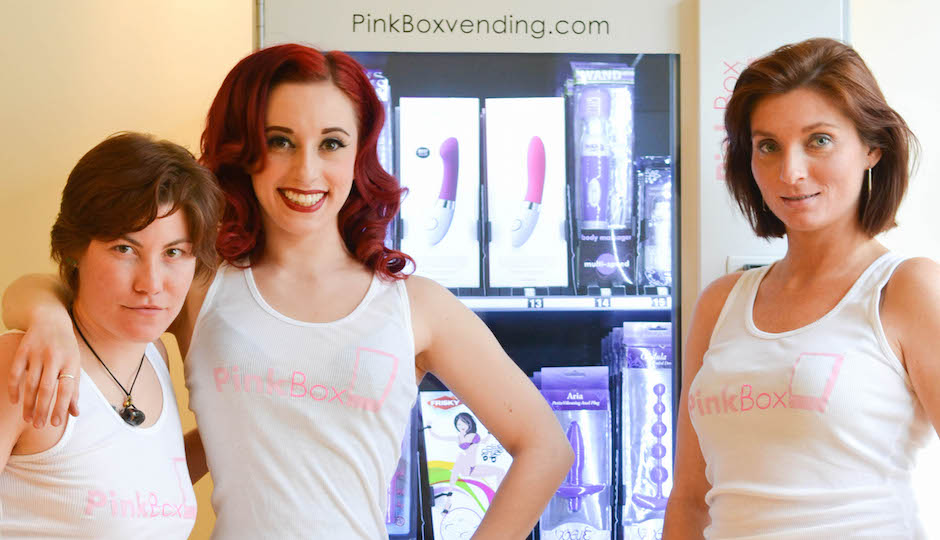 Models showing off PinkBox, which one commenter says would be better if it was a claw game. 