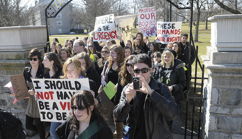 In this Wednesday, March 2, 2011 file photo, students at Dickinson College in Carlisle, Pa. march across the campus demanding the school deal more harshly with students who commit sexual offenses.  (AP Photo/The Sentinel, Jason Malmont)
