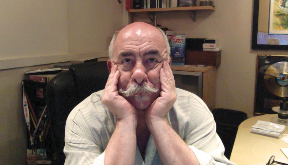John DeBella in his home office waiting for his brother to FaceTime him, May 1, 2015.