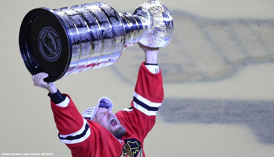 Chicago Blackhawks defenseman Kimmo Timonen hoists the Stanley Cup after defeating the Tampa Bay Lightning in game six of the 2015 Stanley Cup Final at United Center. 