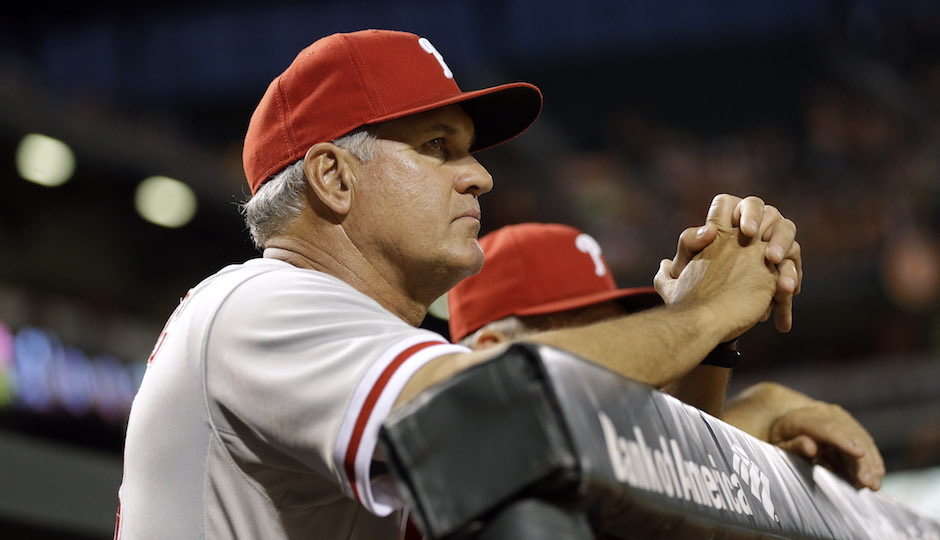Philadelphia Phillies manager Ryne Sandberg watches from the dugout in the fifth inning of an interleague baseball game against the Baltimore Orioles, Tuesday, June 16, 2015, in Baltimore. Baltimore won 19-3. (AP Photo/Patrick Semansky)