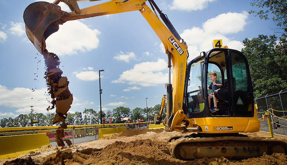 Kid playing in a TK at Diggerland. | Photo by Daryl Peveto