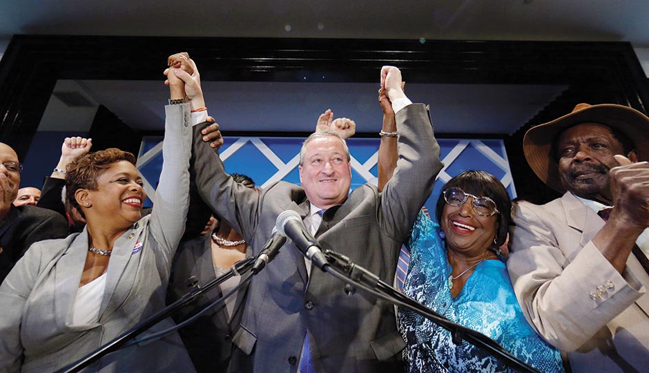 Kenney and supporters on election night. Photograph by Matt Slocum, Associated Press