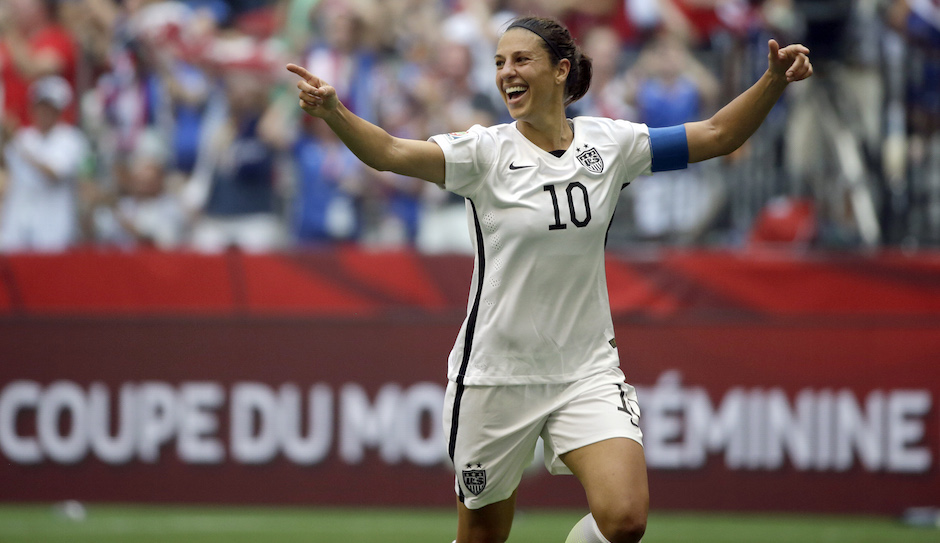 United States' Carli Lloyd celebrates after scoring her third goal against Japan during the first half of the FIFA Women's World Cup soccer championship in Vancouver, British Columbia, Canada, Sunday, July 5, 2015. (AP Photo/Elaine Thompson)