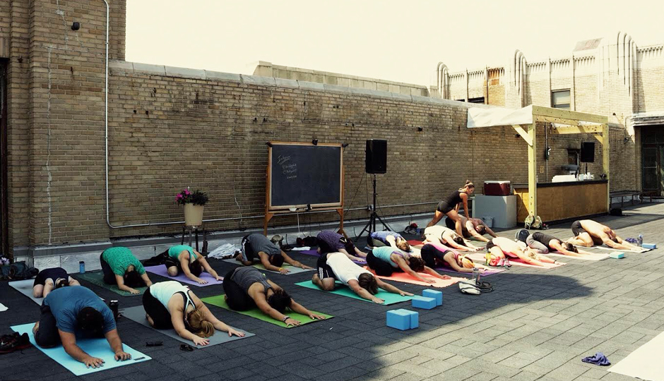 Rooftop yoga at Le Bok Fin | Photo by Josh Thornton