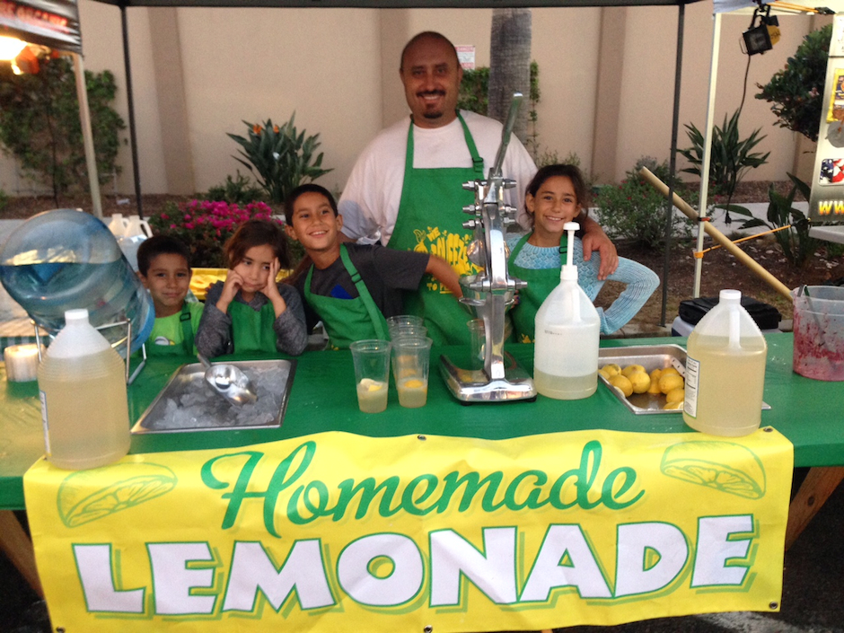 Aaron Miranda and four of his five kids at their lemonade stand in California. 