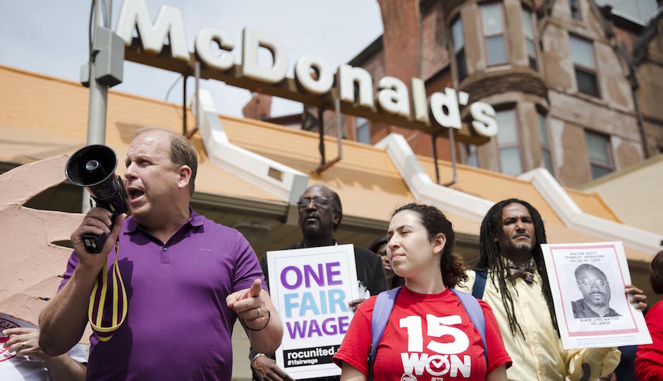 Pennsylvania State Sen. Daylin Leach, D-Montgomery, at a May Day demonstration calling for a raise of the minimum wages to $15 an hour Friday, May 1, 2015, at a McDonald's restaurant in Philadelphia. Leach is purposing legislation to increase the minimum wages to $15, index it to inflation, and eliminated the tipped minimum wage. (AP Photo/Matt Rourke)