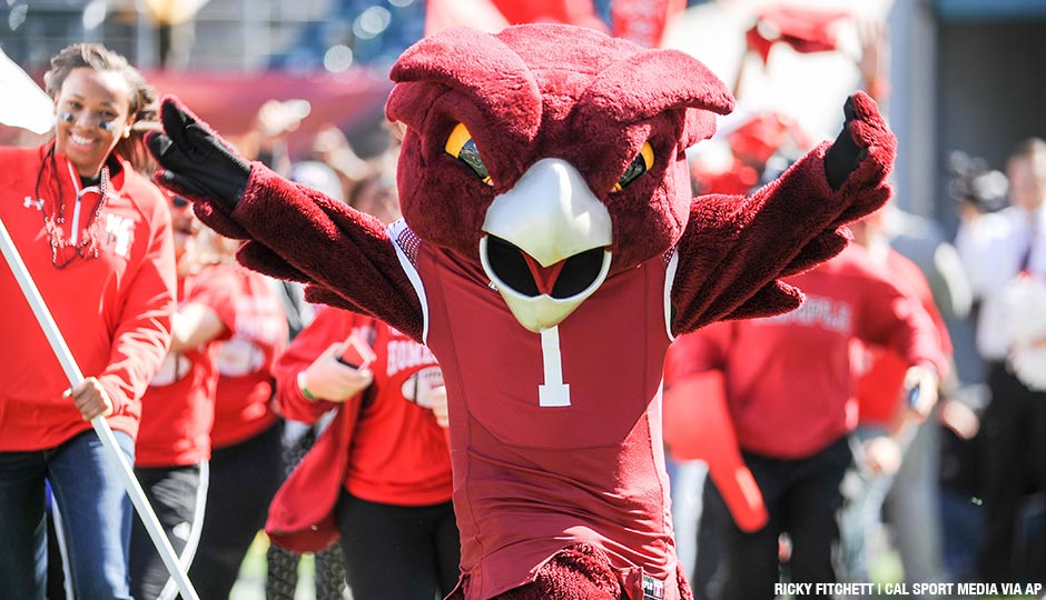 The Temple Owl mascot leads the team onto the field during an October 10, 2015, game against Tulane at Lincoln Financial Field.