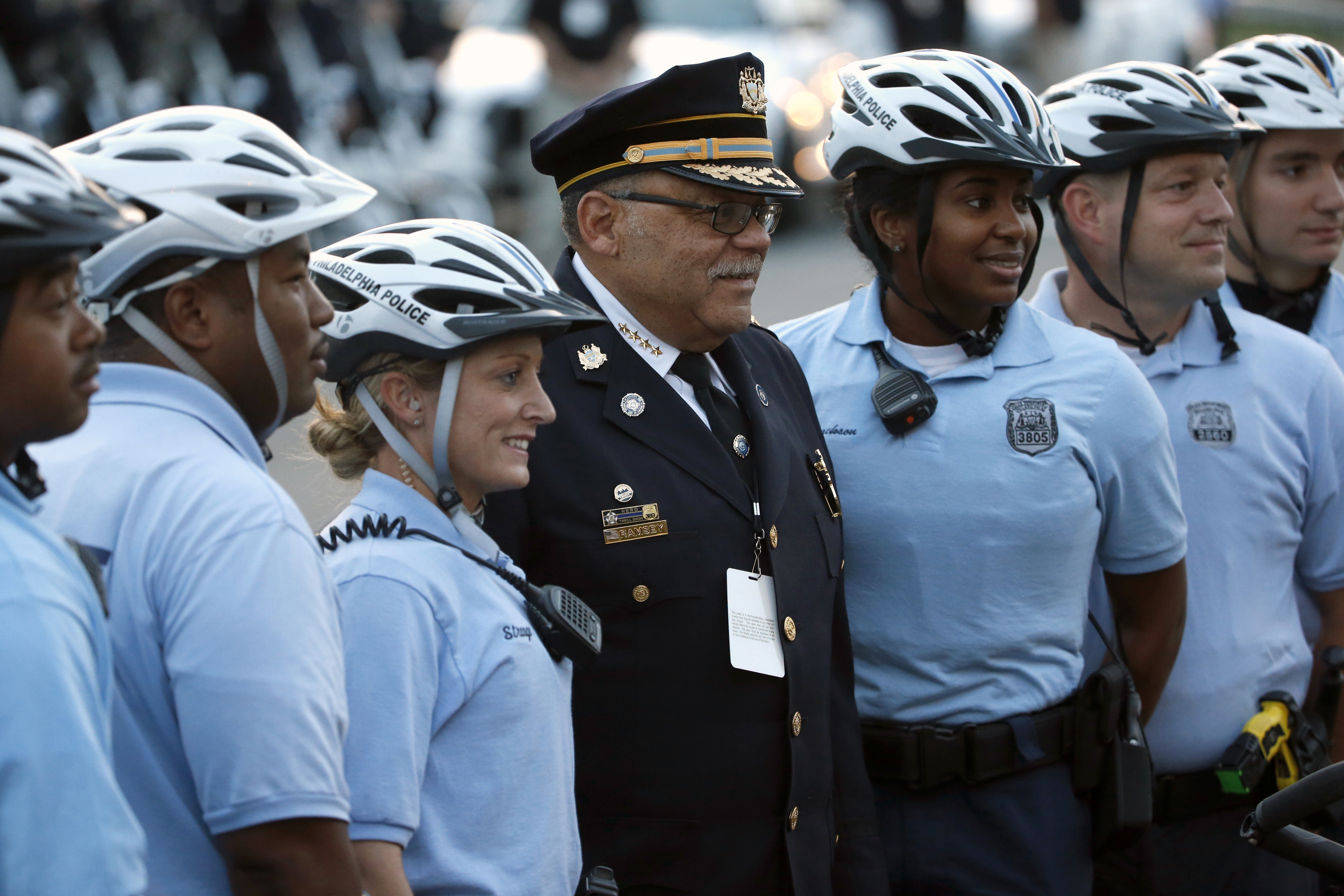 Philadelphia Police Commissioner Charles Ramsey poses with other police officers Saturday, Sept. 26, 2015, in Philadelphia. (AP Photo/Pablo Martinez Monsivais, Pool)