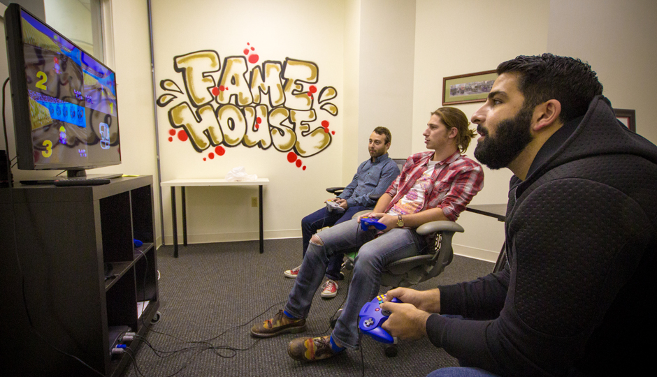A video game break for employees at Fame House.