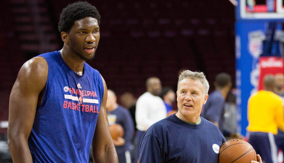 Sixers head coach Brett Brown works with Joel Embiid before the Sixers played the Indiana Pacers last season at the Wells Fargo Center | Bill Streicher-USA TODAY Sports