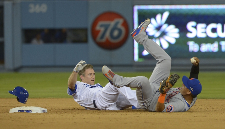 New York Mets shortstop Ruben Tejada (right) collides with Los Angeles Dodgers second baseman Chase Utley (left) at second base during the seventh inning in game two of the NLDS at Dodger Stadium. | Jayne Kamin-Oncea-USA TODAY Sports