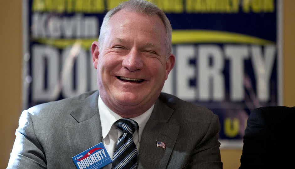 Philadelphia Judge Kevin Dougherty, a Democratic candidate for Pennsylvania Supreme Court smile during a campaign rally on election day, Tuesday, Nov. 3, 2015, in Philadelphia. (AP Photo/Matt Rourke)