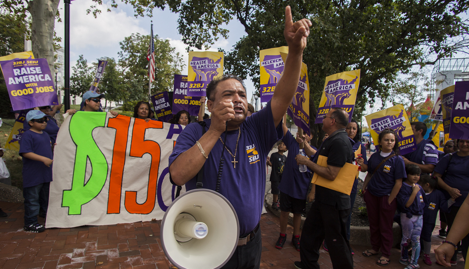 Suburban office cleaners protest for better wages before reaching a new contract agreement on Tuesday. (Photo courtesy of 32BJ SEIU)