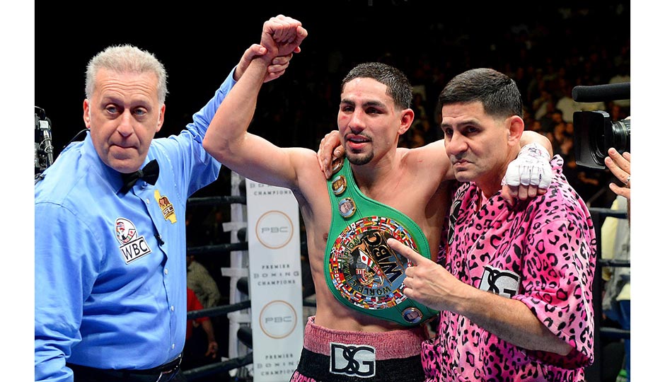 Jan 23, 2016; Los Angeles, CA, USA; Danny Garcia, pumps his fist after defeating Robert Guerrero (not pictured) during their WBC welterweight boxing title fight at Staples Center. Garcia won by decision. Photo | Jayne Kamin-Oncea-USA TODAY Sports