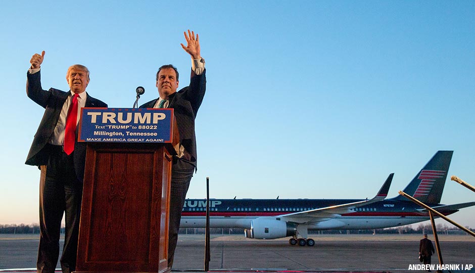 Republican presidential candidate Donald Trump, left, and New Jersey Gov. Chris Christie, right, wave as they arrive at a rally at Millington Regional Airport in Millington, Tenn., Saturday, Feb. 27, 2016.