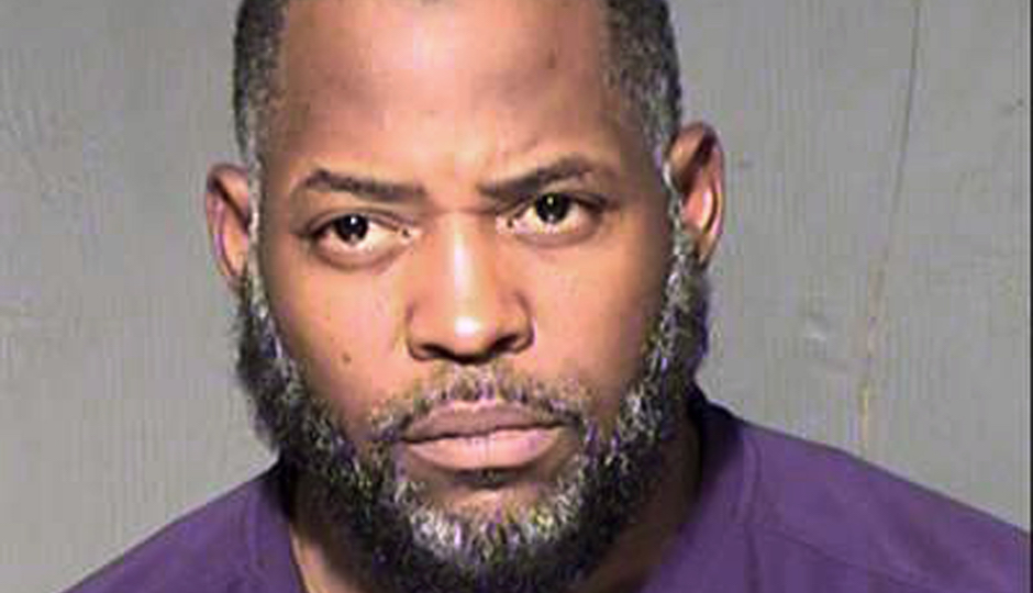 FILE - This undated file law enforcement booking photo from the Maricopa County, Ariz., Sheriff's Department shows Abdul Malik Abdul Kareem. As federal prosecutors in Phoenix investigate whether more people might be involved, the case against 43-year-old Abdul Malik Abdul Kareem provides a window into how Kareem, Elton Simpson and Nadir Soofi planned to attack major events, including the cartoon contest in Texas where Simpson and Soofi were killed by police May 3. The story is one of Arizona's Top 10 stories for 2015.(Maricopa County Sheriff's Department via AP, File)