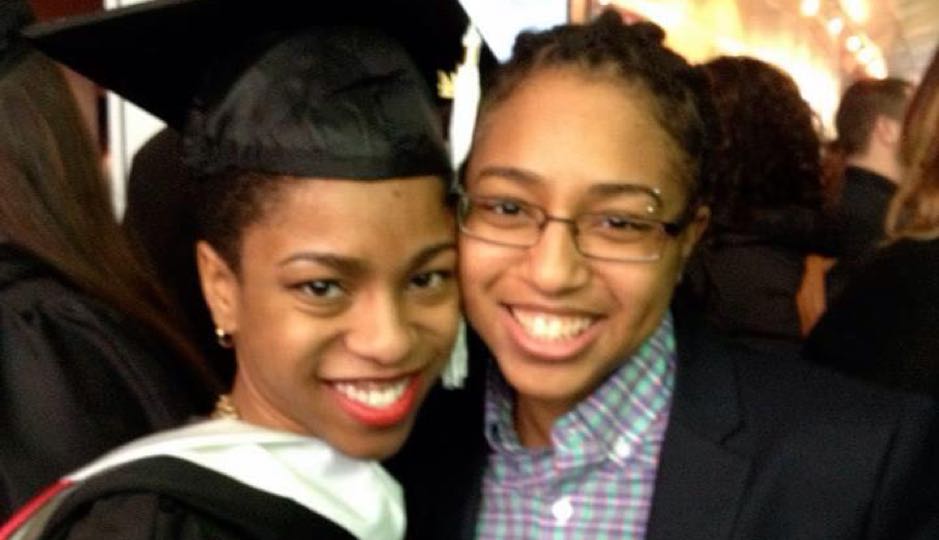 Asha (left) with her partner Tez at her college graduation. 