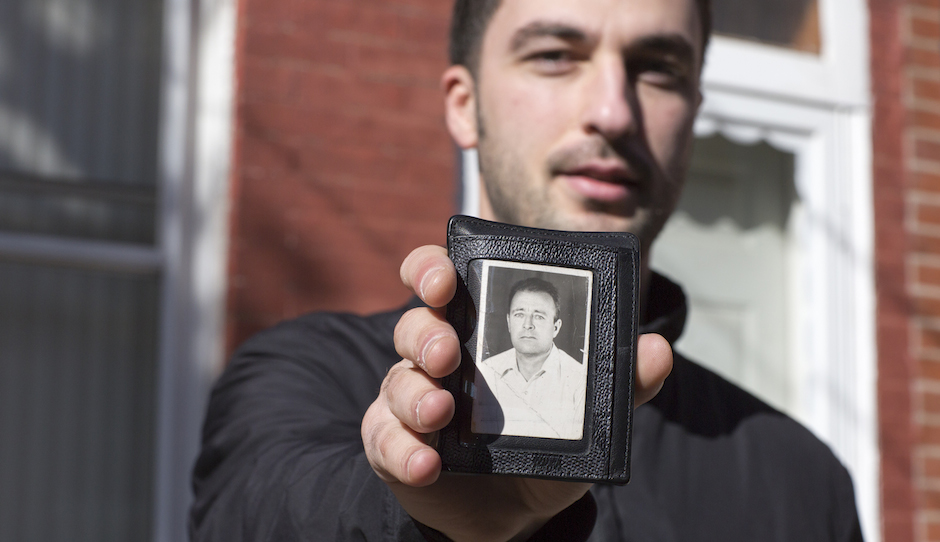 Hakan Ibisi carries a photograph of his grandfather in his wallet. Ibisi was photographed for the Philly Block Project, a collaboration between the Philadelphia Photo Arts Center and Hank Willis Thomas. Photo by Wyatt Gallery/Hank Willis Thomas Studio. 