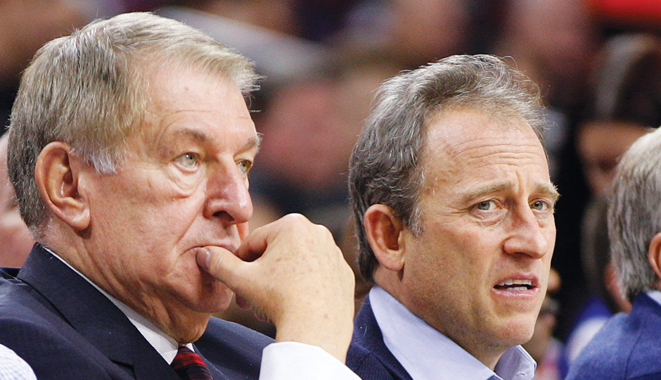 Jerry Colangelo, chairman of basketball operations, and Harris take in another loss. Photo courtesy of the Associated Press. 