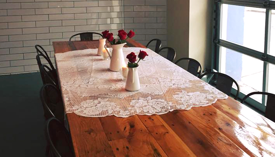 The communal table at Miss Rachel's Pantry | Photo via Facebook