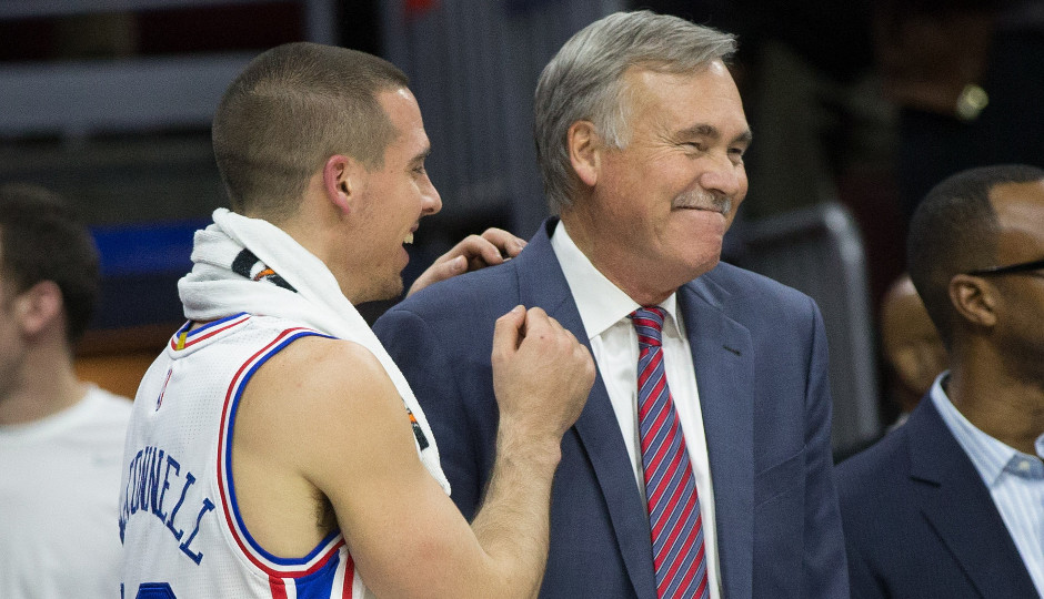 Sixers rookie point guard T.J. McConnell and associate head coach Mike D'Antoni react during a timeout | Bill Streicher-USA TODAY Sports