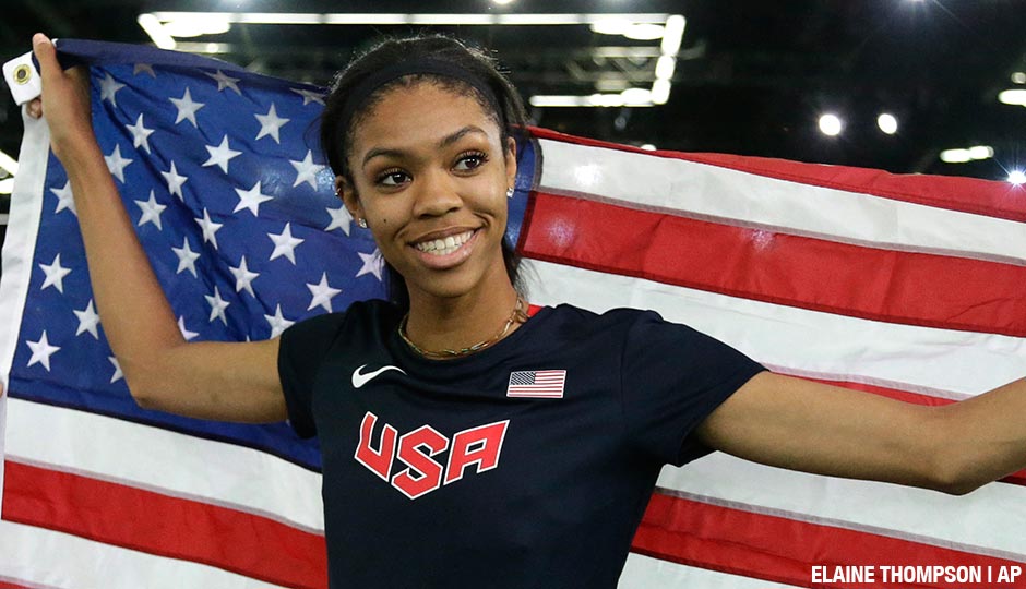 Vashti Cunningham holds the U.S. flag after winning the women's high jump final during the World Indoor Athletics Championships, Sunday, March 20, 2016, in Portland, Ore. Cunningham won the event. 